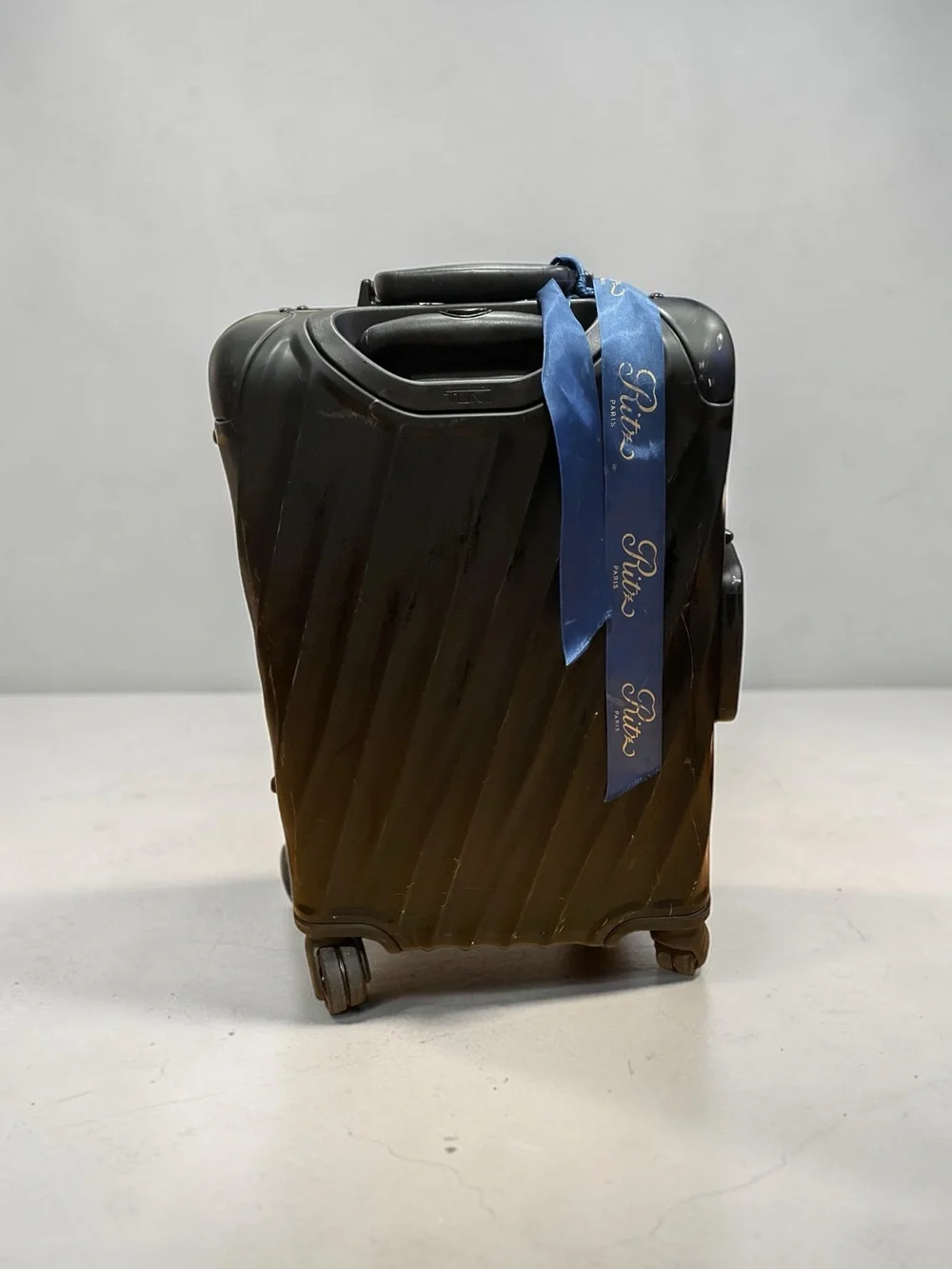 Tumi Black Diagonal-Rib Hard-Shell Spinner Carry-On